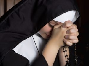 Nun in Prayer